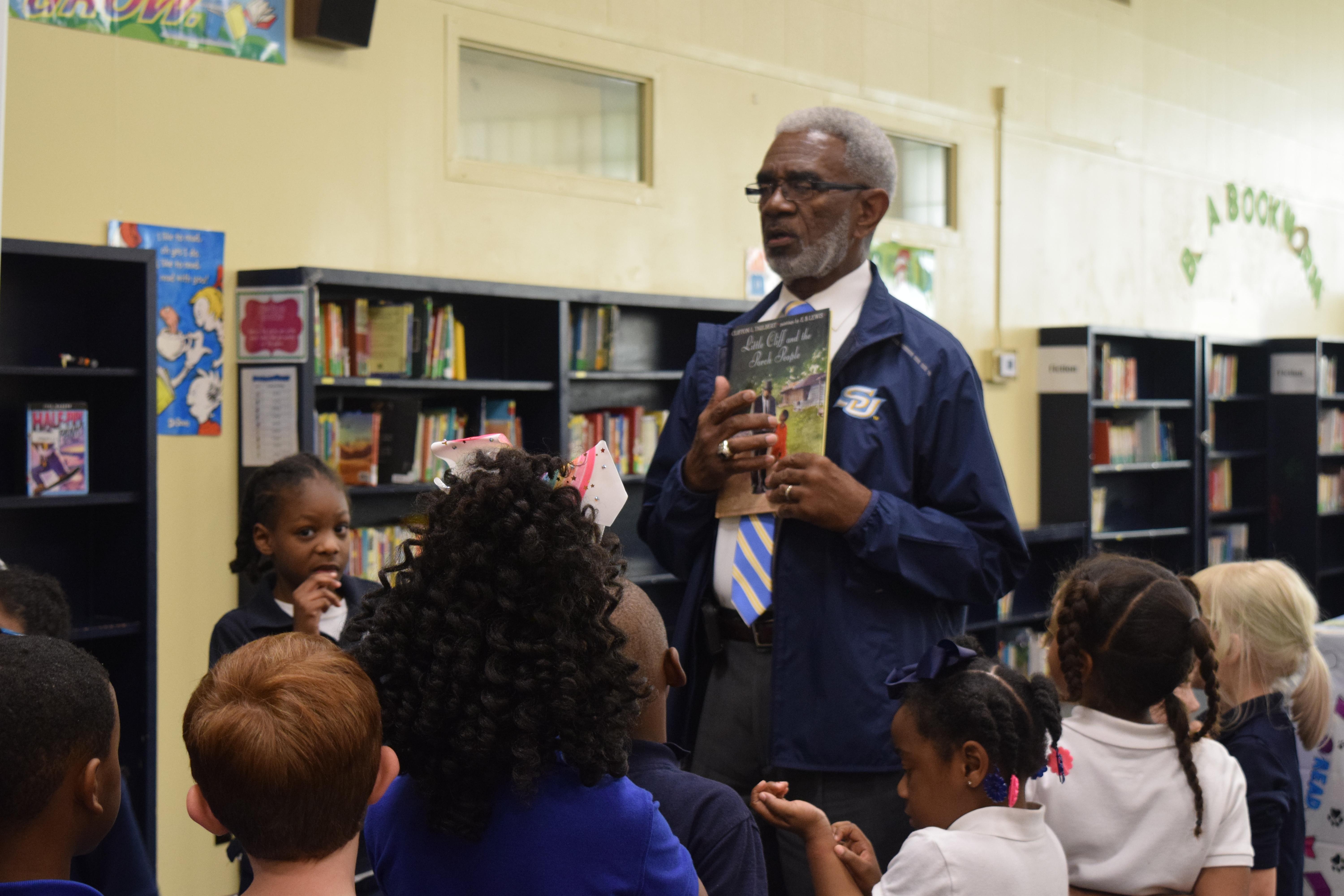 NASD Board member and Superintendent Give Students a Book